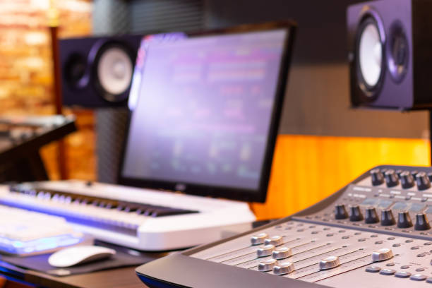 istock digital mixing console in home recording studio, post production, editing, broadcasting concept 1153877138