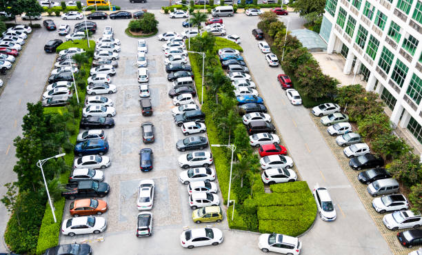 istock High angle view of parking lot in residential district 1153877890