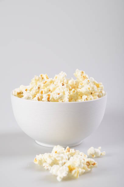istock Popcorn bowl isolated on white, clipping path included. 1153877901