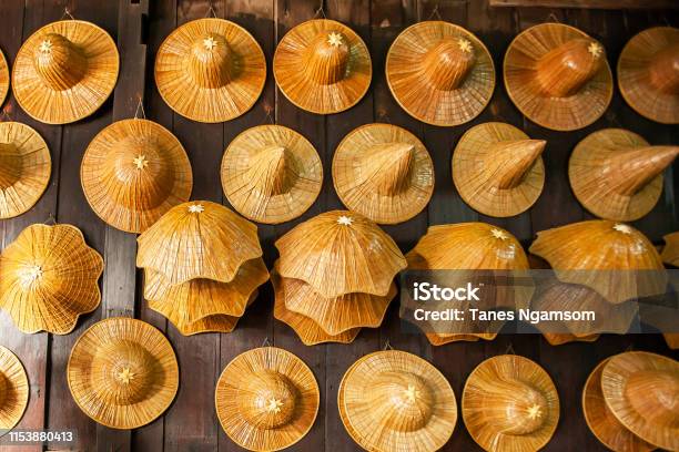 A Lot Of Farmers Weaving Hat Are Displays In Souvenir Shop Stock Photo - Download Image Now