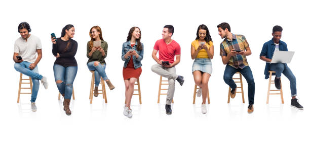 Group of university classmates using technology A horizontal photo of millennial university students sitting together and each using an electronic device. latin american and hispanic culture photos stock pictures, royalty-free photos & images