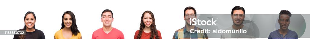 Close up of students standing side by side A mid body view of college students standing side by side looking at the camera andvsmiling. White Background Stock Photo