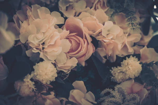 istock Beautiful Artificial Flowers Background, Vintage style; 1153880742