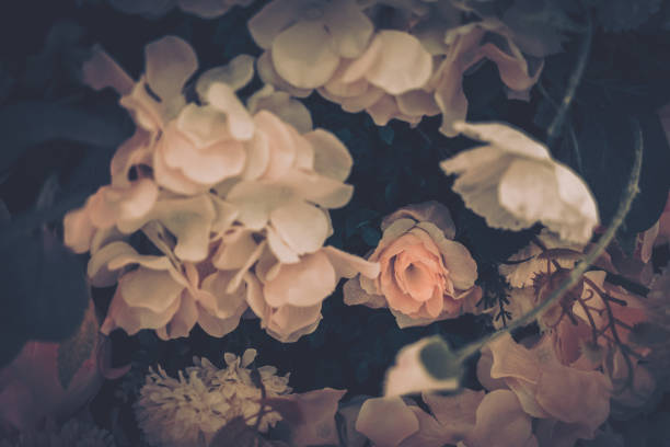 istock Beautiful Artificial Flowers Background, Vintage style; 1153880753