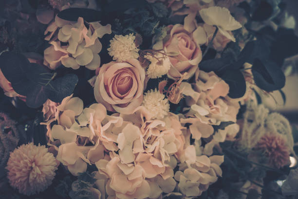 istock Beautiful Artificial Flowers Background, Vintage style; 1153881152