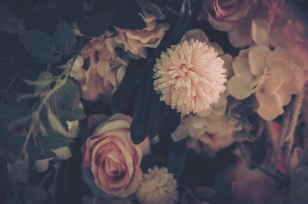 istock Beautiful Artificial Flowers Background, Vintage style; 1153881260