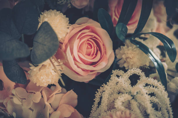 istock Beautiful Artificial Flowers Background, Vintage style; 1153881268