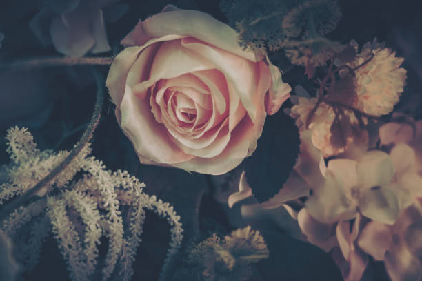 istock Beautiful Artificial Flowers Background, Vintage style; 1153881269