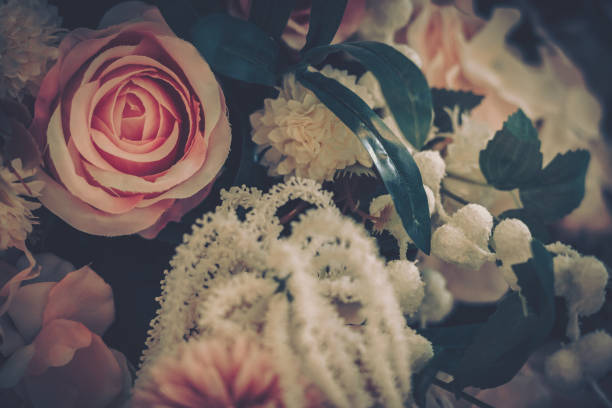 istock Beautiful Artificial Flowers Background, Vintage style; 1153881288