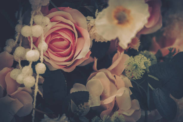 istock Beautiful Artificial Flowers Background, Vintage style; 1153881306