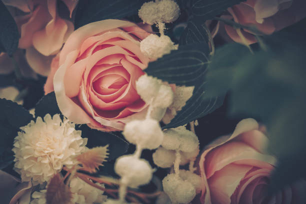 istock Beautiful Artificial Flowers Background, Vintage style; 1153881323