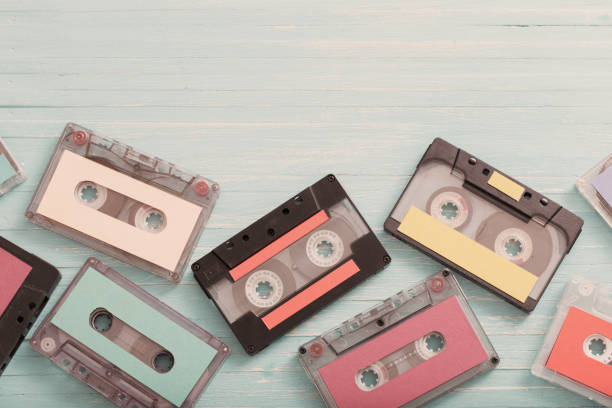 istock Old plastic cassette on wooden background. Retro music concept 1153883922