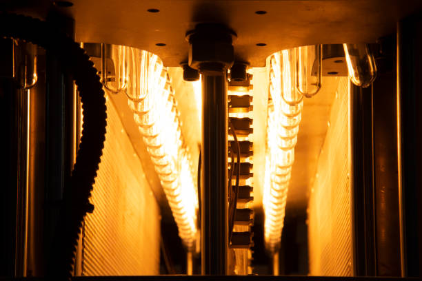 istock The  preform shape of plastic bottles  in the conveyor belt  for heating process. 1153884072
