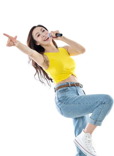 istock Cheerful woman singing on white background 1153885490