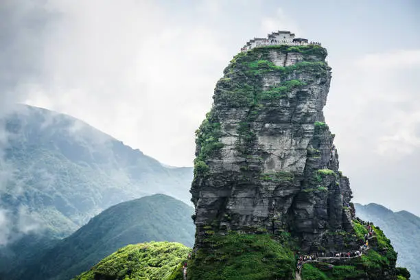 Fanjing mountain scenery with view of the red cloud golden summit with Buddhist temple on the top in Guizhou China