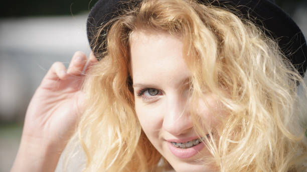 istock Woman wearing fedora outdoor 1153888643
