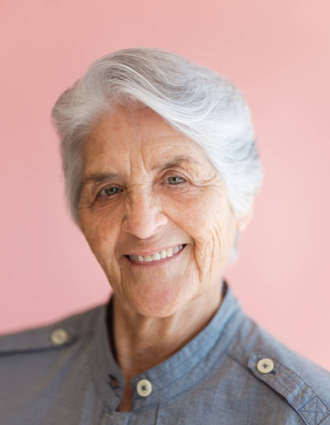 istock Cute grandmother smiling 1153889279