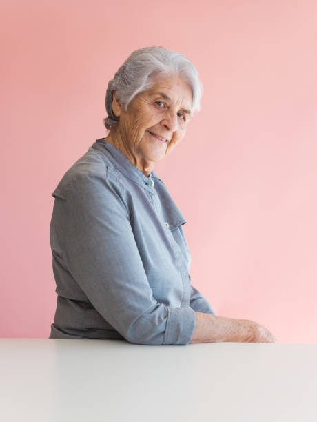 istock Latin senior woman looking at the camera 1153889283