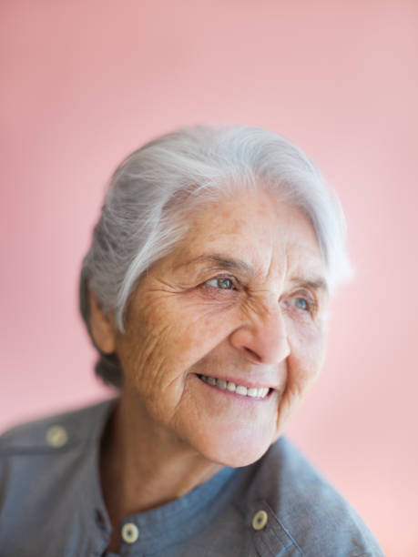 istock Sweet grandmother looking away from camera 1153889333