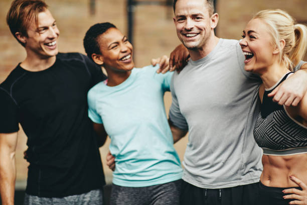 istock Diverse group of friends laughing after a workout session 1153889537