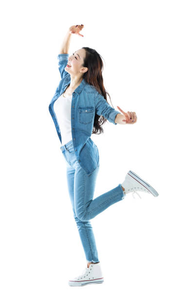istock Beautiful woman dancing on white background 1153890888