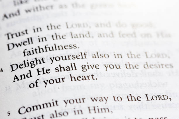 Psalm 37: Delight yourself also in the Lord Bible lies open at Psalm 37. number 37 stock pictures, royalty-free photos & images
