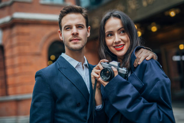istock Young couple standing outdoors 1153896582