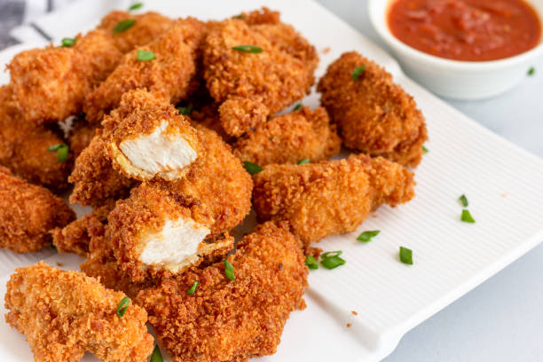 istock Chicken Nuggets Close-Up Photo 1153897940
