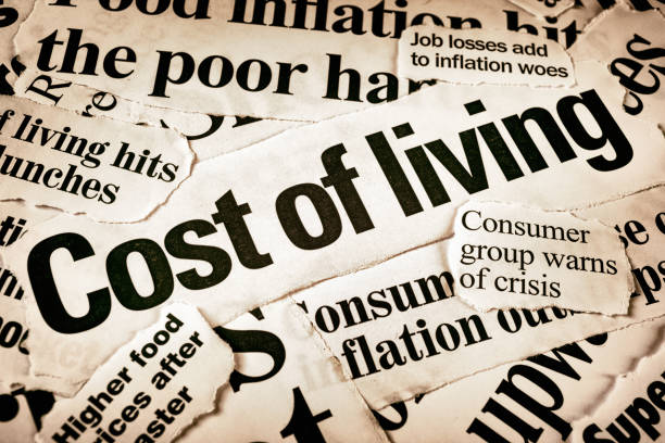 Newspaper headlines warn of high cost of living Newspaper headlines on the theme of inflation. cost of living stock pictures, royalty-free photos & images