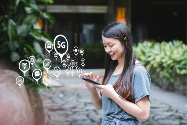 istock Young lady using 5G on her smartphone 1153904844