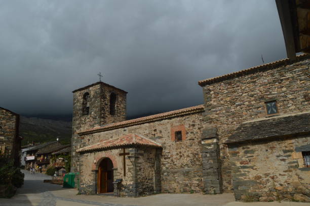 Main Facade Of The Parish Church Of San Ildefonso Valverde De Los Arroyos. stock photo