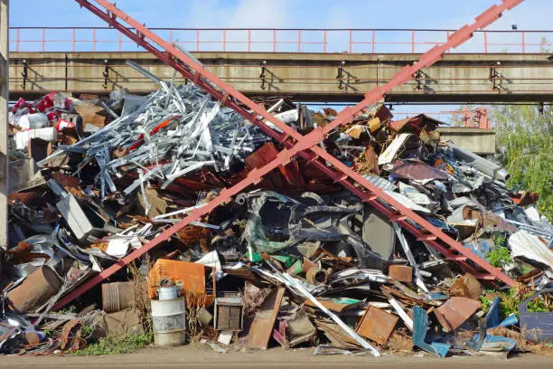 Big pile of scrap metal recycling of raw materials