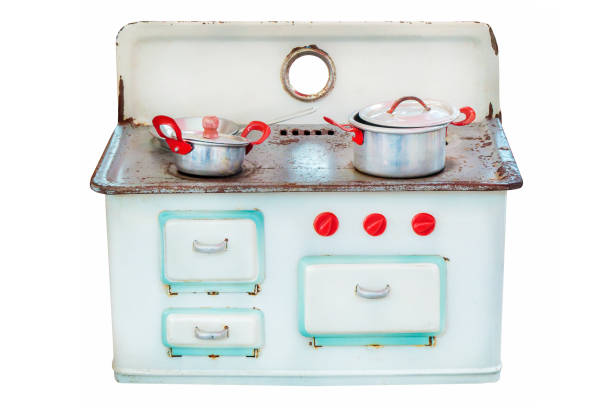 Retro doll house cooking stove isolated on white