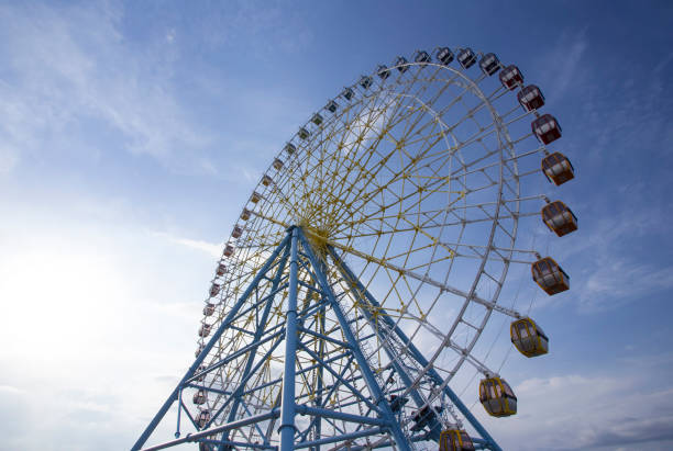 istock Ferris Wheel Over Blue Sky 1153915117