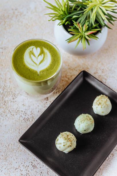 istock hot mocha green tea latte with candies 1153919113