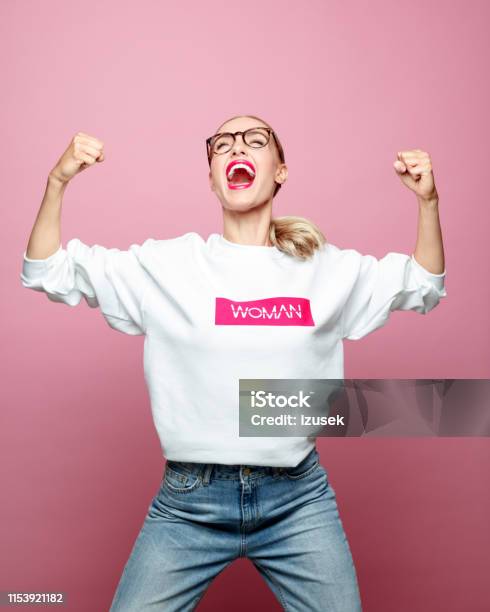 Successful Mid Adult Woman Screaming Stock Photo - Download Image Now - Women, One Woman Only, Strength