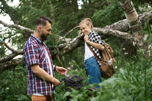 istock Young couple in the forest 1153921202
