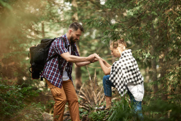 istock Couple hiking in the forest 1153921784