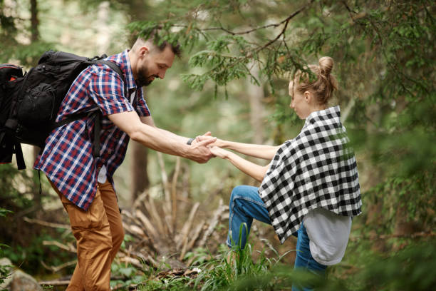 istock Couple hiking in the forest 1153921791