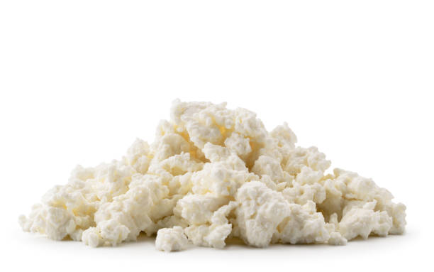 istock Heap of cottage cheese on a white background. Isolated 1153921833