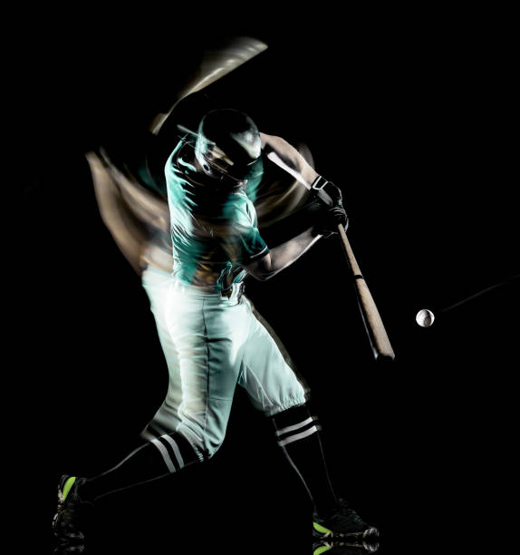 baseball player man isolated black background light painting