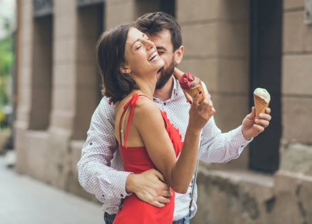 Young couple eating an ice cream