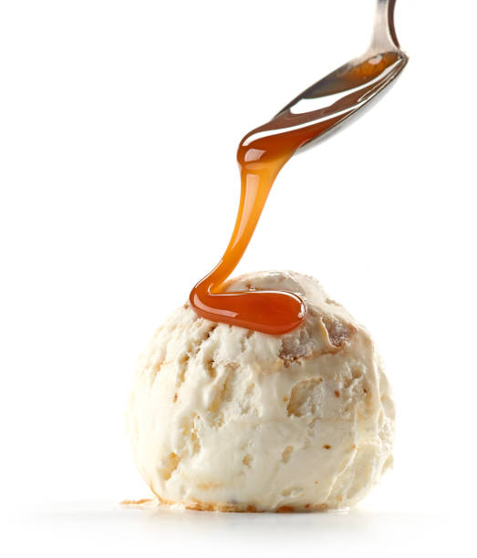 istock ice cream with caramel sauce 1153924476