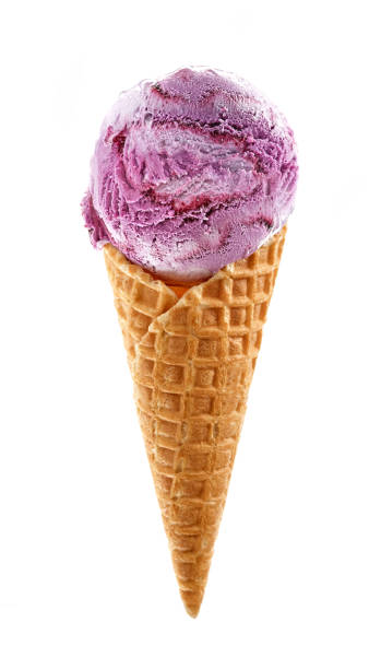 istock blueberry ice cream in waffle cone isolated on white background 1153924528