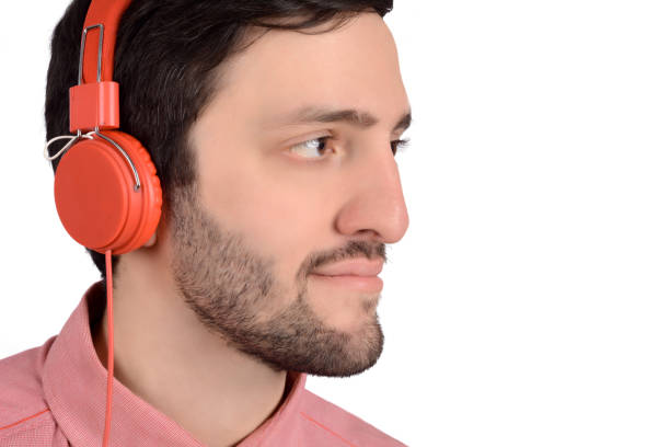 istock Young man with headphones 1153927553