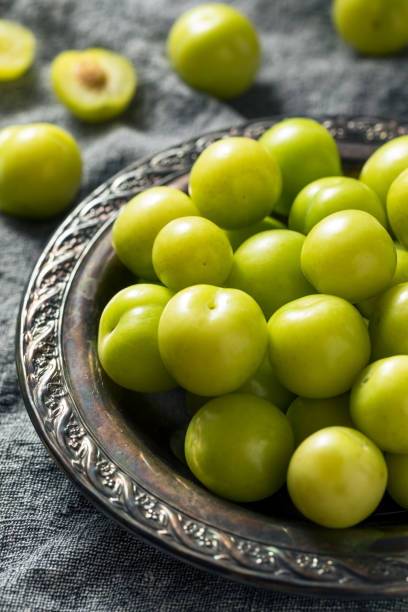 istock Raw Green Organic Sour Plums 1153928735