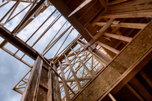 istock Building construction, wood framing structure at new property development site 1153928864