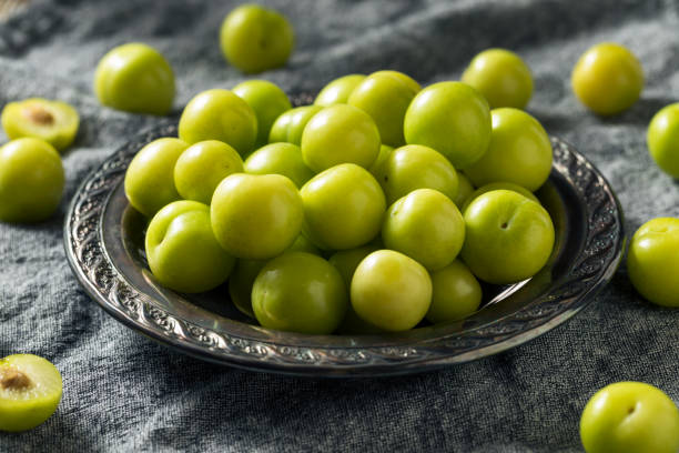 istock Raw Green Organic Sour Plums 1153929555
