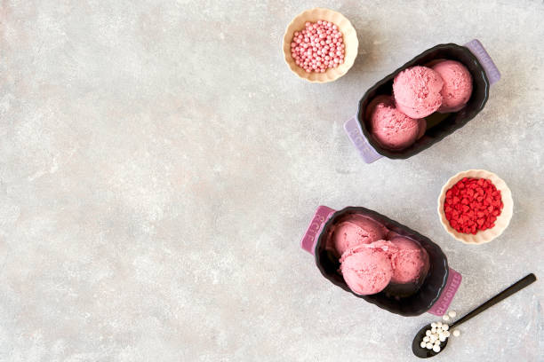 istock Berry pink ice cream with serving ingredients. Top view , copy space 1153930115