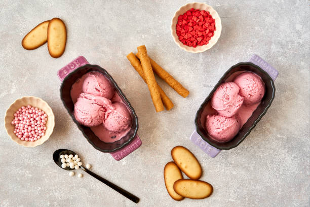 istock Berry pink ice cream with serving ingredients. Top view , copy space 1153930249